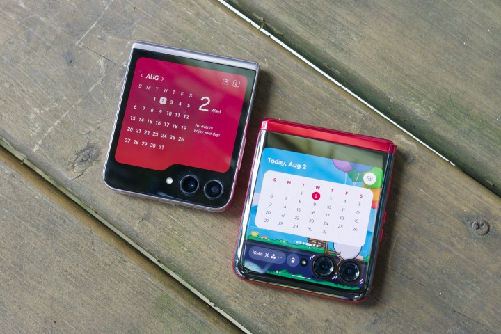 The Samsung Galaxy Z Flip 5 abutting to the Motorola Razr Plus, both assuming their awning screens.