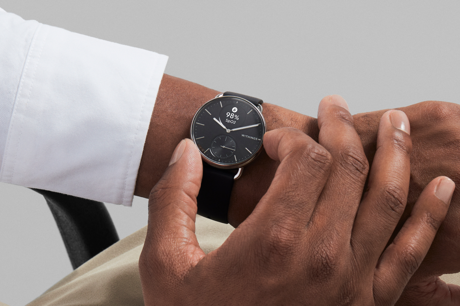 A person wearing the Withings ScanWatch 2 38mm.