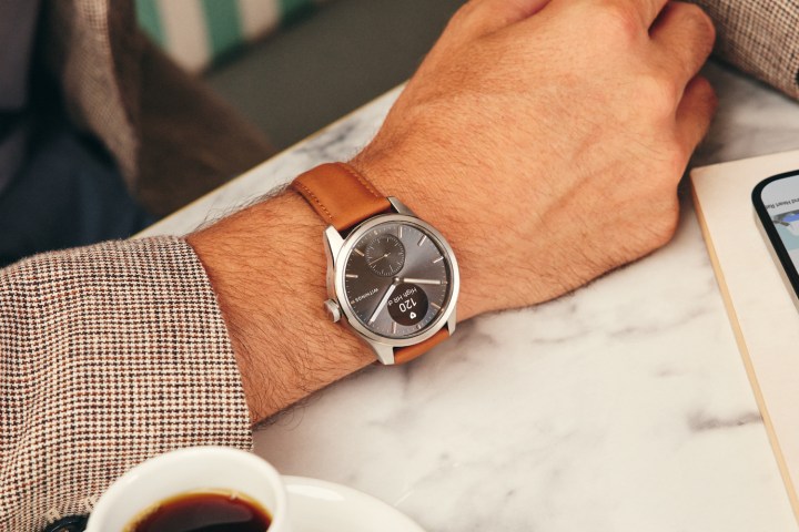 A person wearing the Withings ScanWatch 2 42mm.