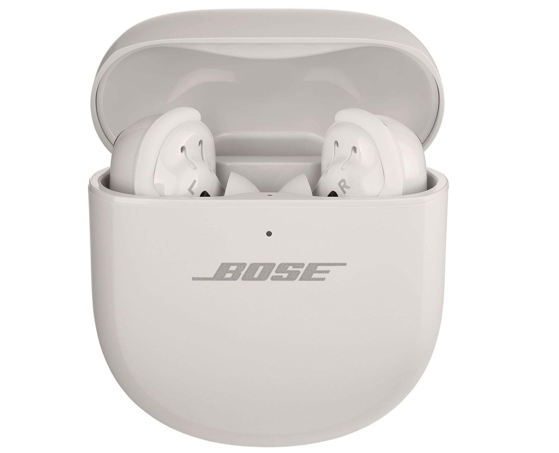 Bose QuietComfort Ultra Earbuds in white, sitting in charging case.