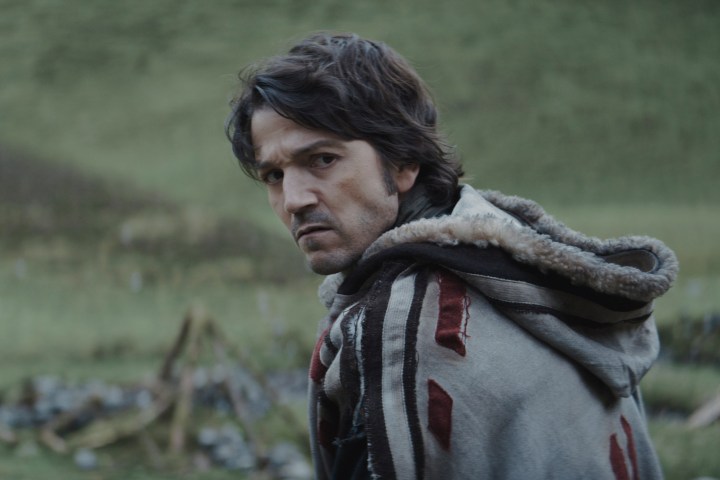 Cassian Andor stands by a hillside in Andor season 1.