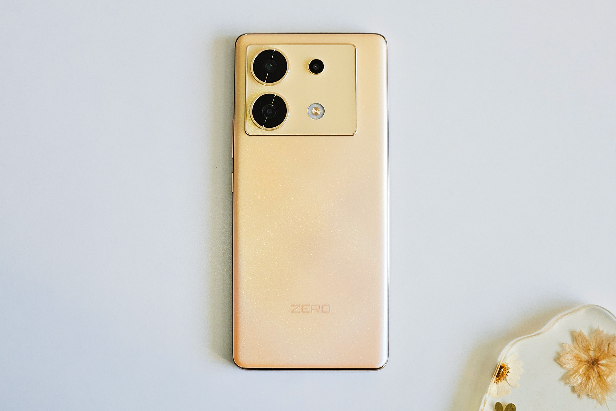 The Infinix Zero 30 laying face-down on a table.