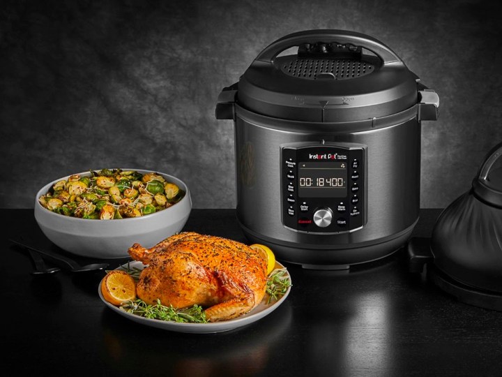 The Instant Pot 8-quart Pro Crisp EPC and Air Fryer with a meal on a counter.
