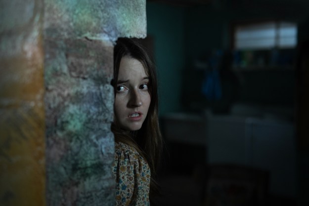 Kaitlyn Dever hides in a basement in No One Will Save You.