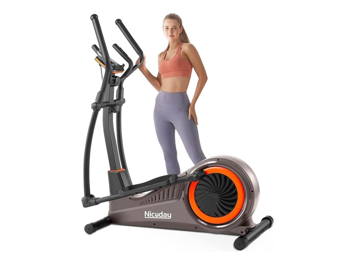 A woman stands at the Niceday 16-level elliptical machine against a white background.