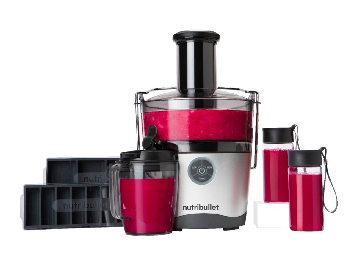 The Nutribullet centrifugal juicer and its included accessories against a white background.