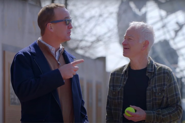 Peyton Manning and John McEnroe stand next to each and every diversified and focus on.