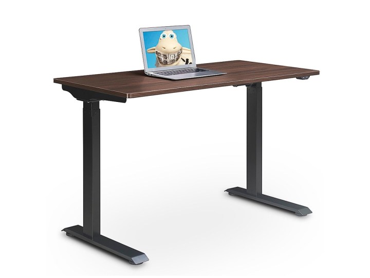 The Serta Creativity Electric Height Adjustable Standing Desk with a laptop against a white background.