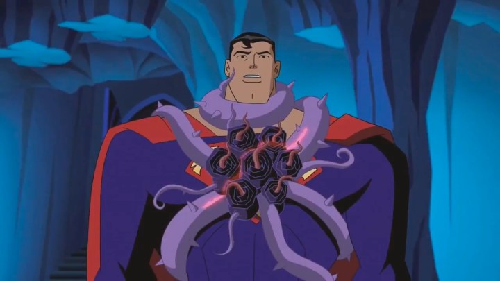 Супермен с паразитом, прикрепленным к его груди "Лига справедливости без ограничений."