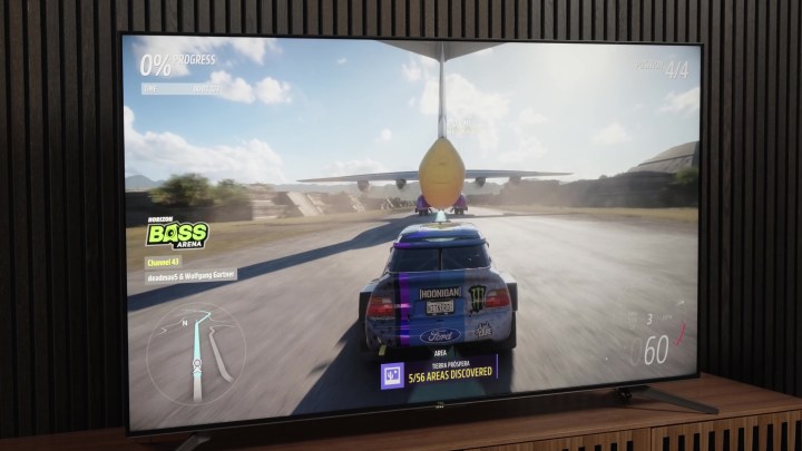 A car-racing video game on a TCL Q7 TV.