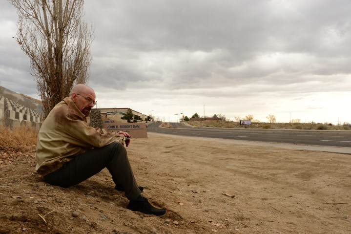 Walter White sits by the side of the road in Breaking Bad season 5.