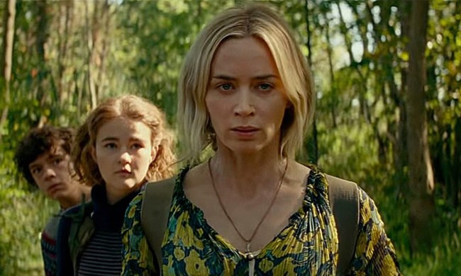 Evelyn from A Quiet Place Part II looking determined, her kids behind her.