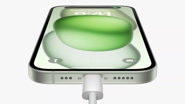 A promotional image showing the USB C port on the iPhone 15.