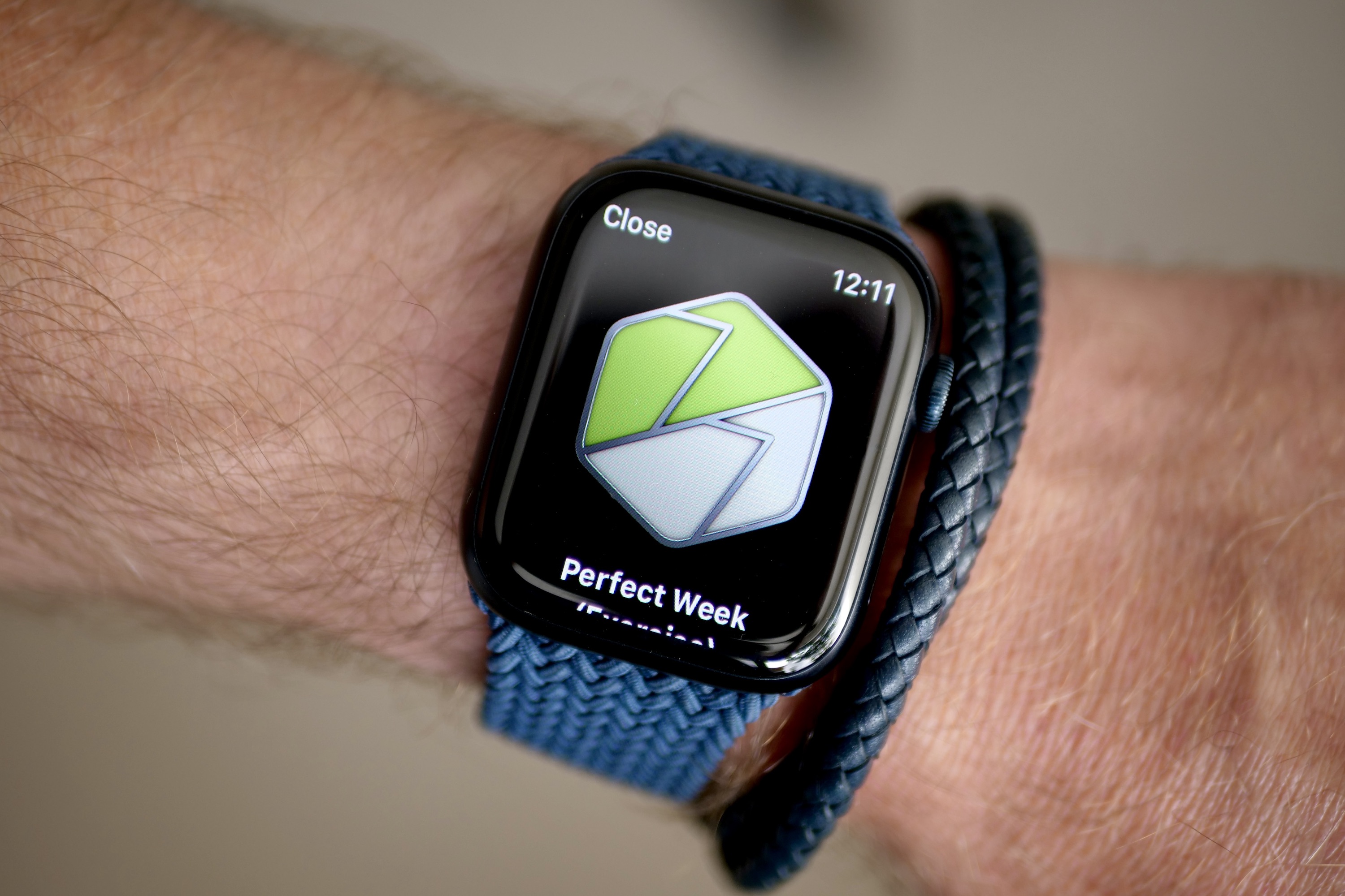 The Apple Watch Series 8 showing a Perfect award for exercise.