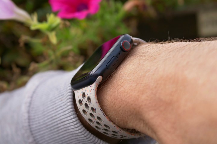 A person wearing the Apple Watch Series 9, showing the side of the watch.