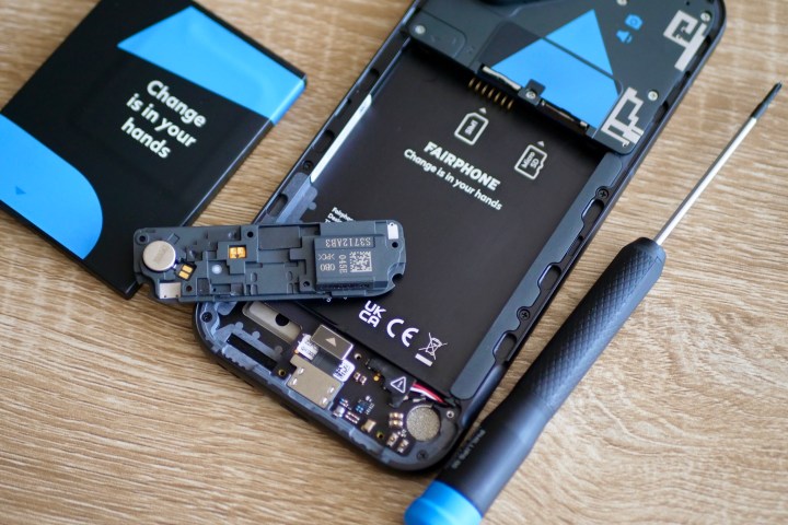Components inside the Fairphone 5, after it has been taken apart.