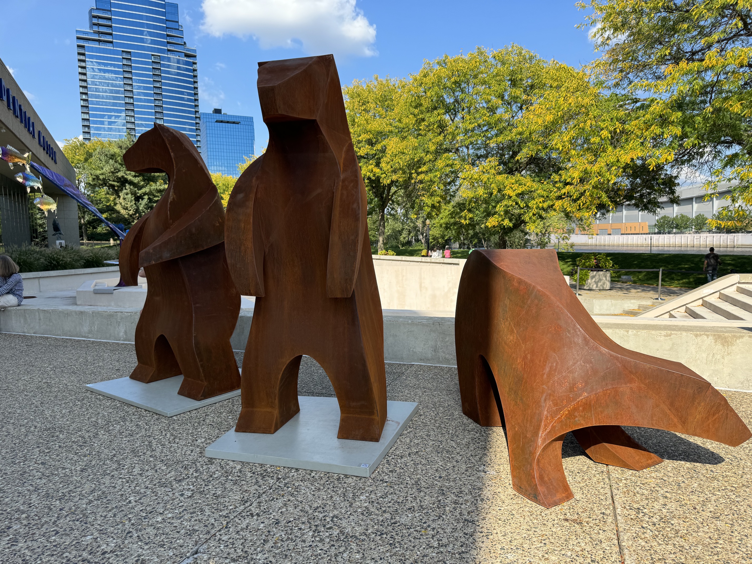Photo from the iPhone 15 Pro Max main camera of three wooden bears.