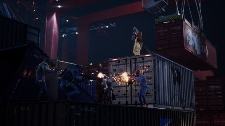 Robbers and cops shoot one another on shipping containers in Payday 3.