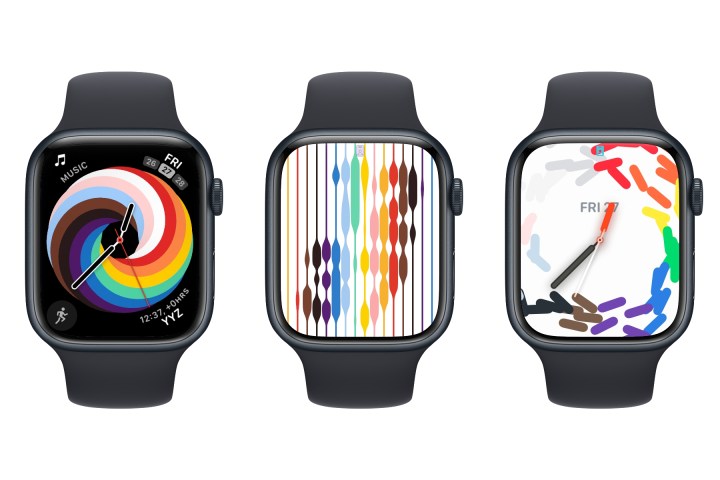 Three Apple Watches showing Pride watch faces.