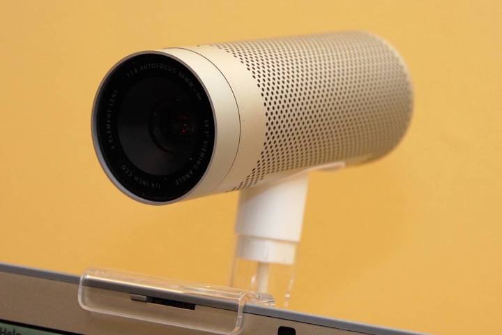 An Apple iSight webcam mounted on a computer monitor.