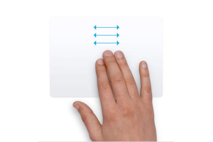 A hand performing a trackpad gesture in macOS, with three fingers moving horizontally.