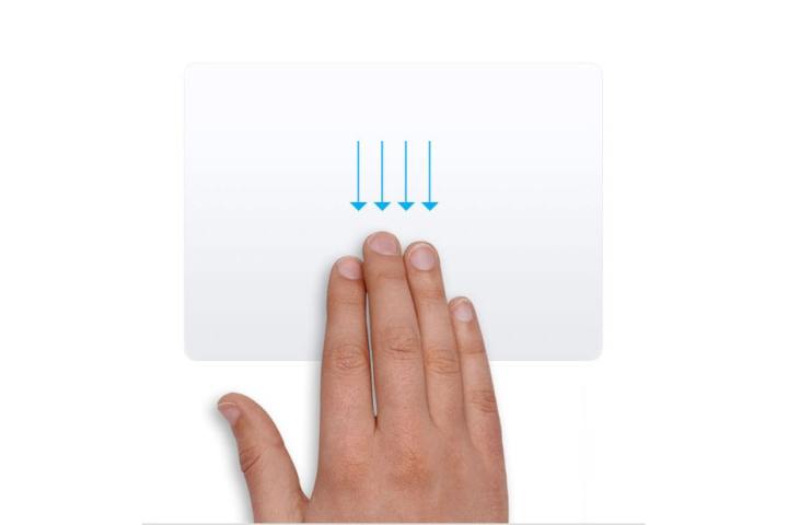 A hand performing a trackpad gesture in macOS, with four fingers moving vertically down.