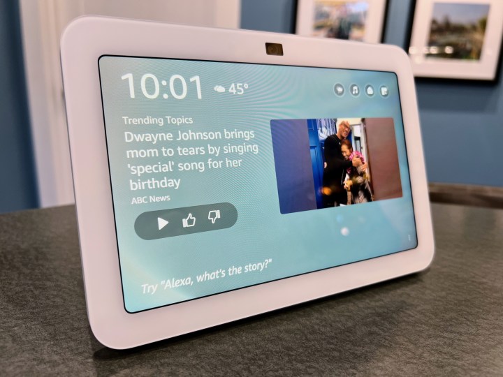 The content gallery on Amazon's Echo Show 8 displays a news item about Dwayne "The Rock" Johnson.