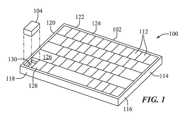 Una ilustración de una patente de Apple que muestra una tecla de teclado extraíble que se puede usar como mouse inalámbrico.