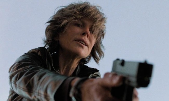 Nicole Kidman points a gun in Destroyer.
