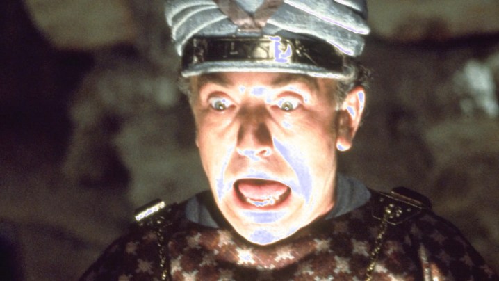 A man screaming while a light flashed on his face in Raiders of the Lost Ark.