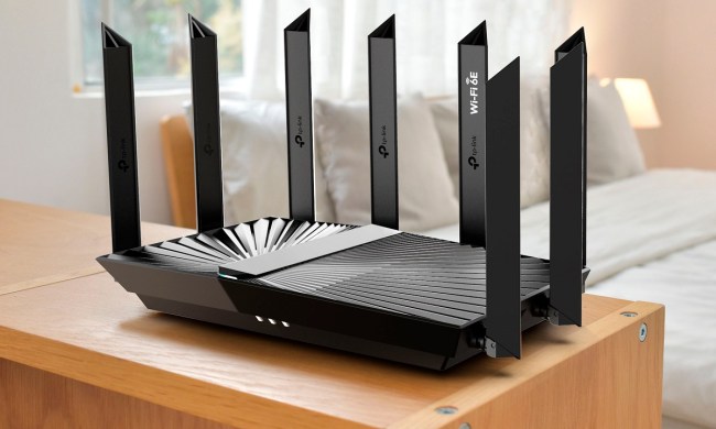 The TP-Link Archer AXE7800 tri-band Wi-Fi 6E router in a room.
