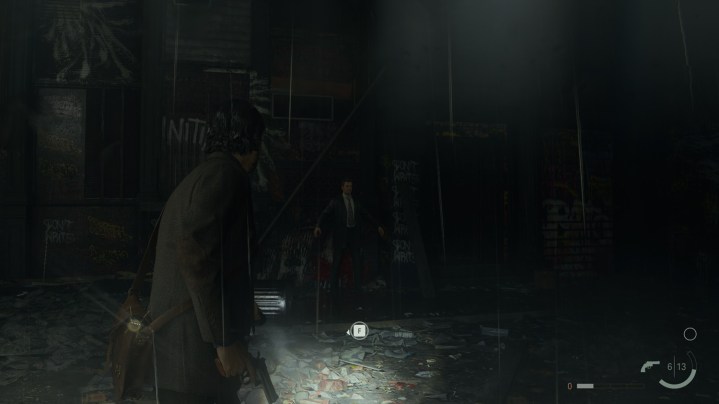 A character in their default pose in Alan Wake 2.