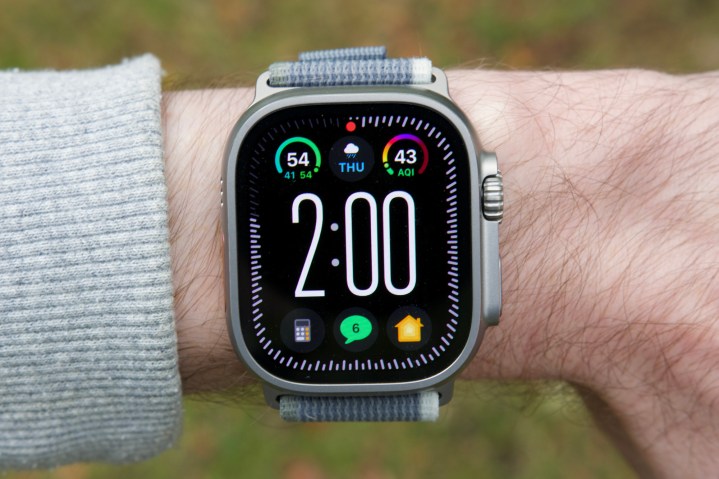Someone wearing an Apple Watch Ultra 2, showing the Modular Ultra watch face.