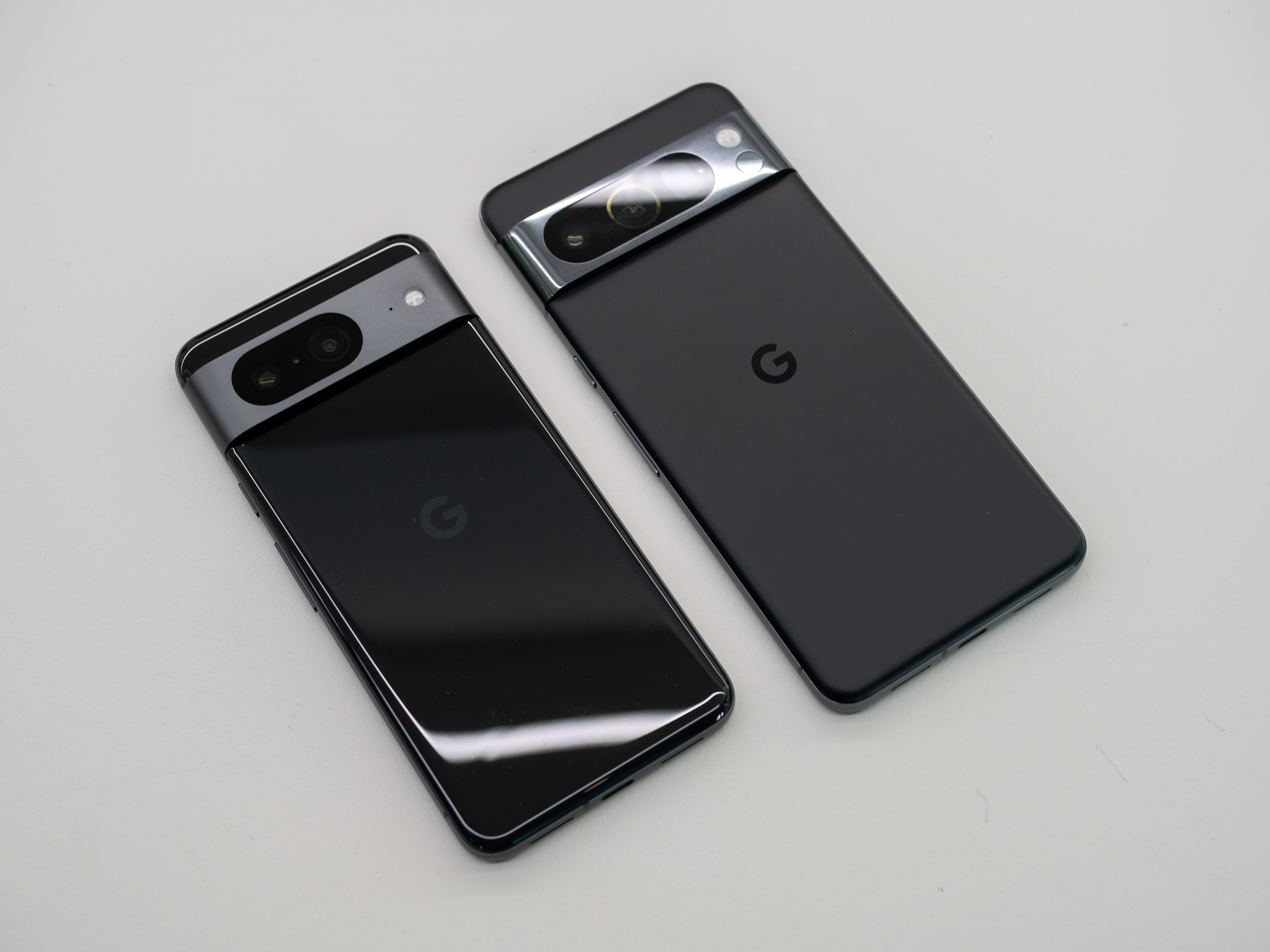 Google Pixel 8 Pro and Google Pixel 8, both in black.