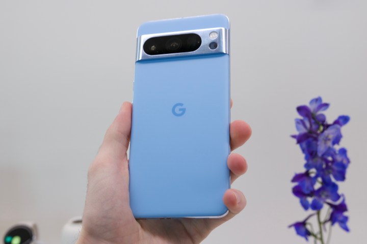 Someone holding a blue Pixel 8 Pro.