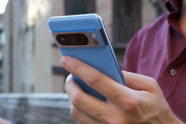 Close-up view of someone holding the Google Pixel 8 Pro.
