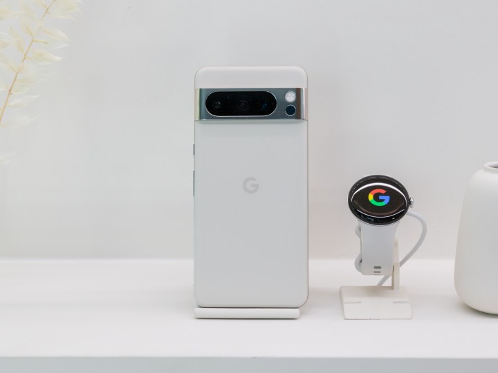 Google Pixel 8 Pro in white with a matching Pixel Watch 2.