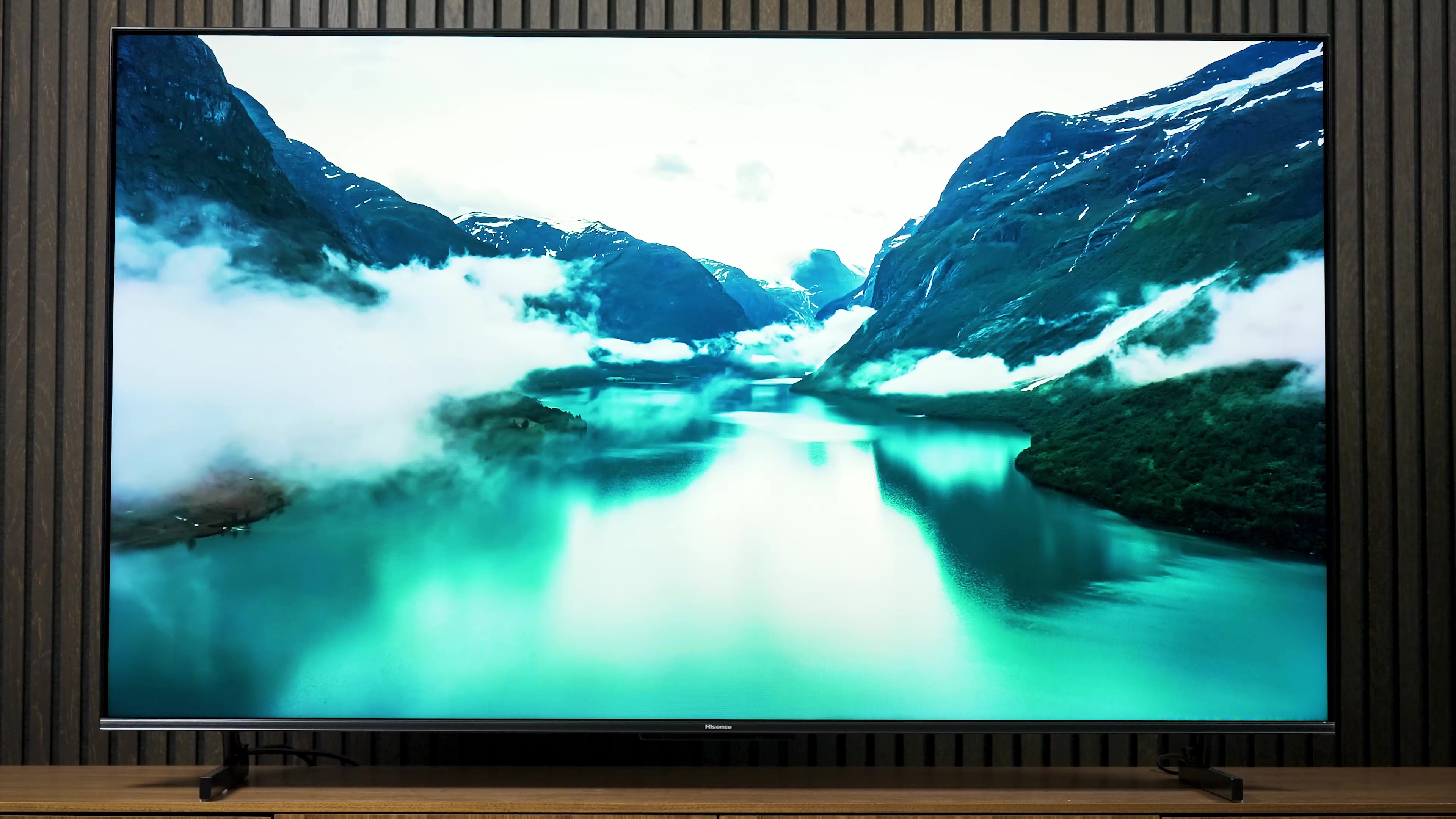 A fjord with glacially green waters shown on a Hisense U7K.