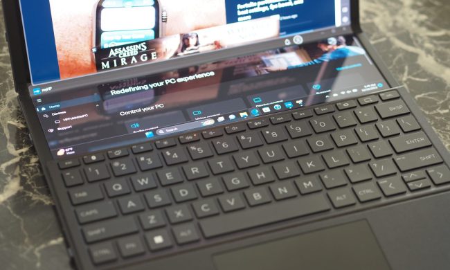 HP Spectre Foldable PC top down view showing keyboard and dual display.