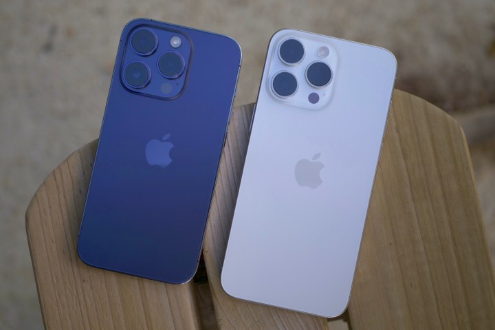 The Apple iPhone 15 Pro Max and iPhone 14 Pro seen from the back.