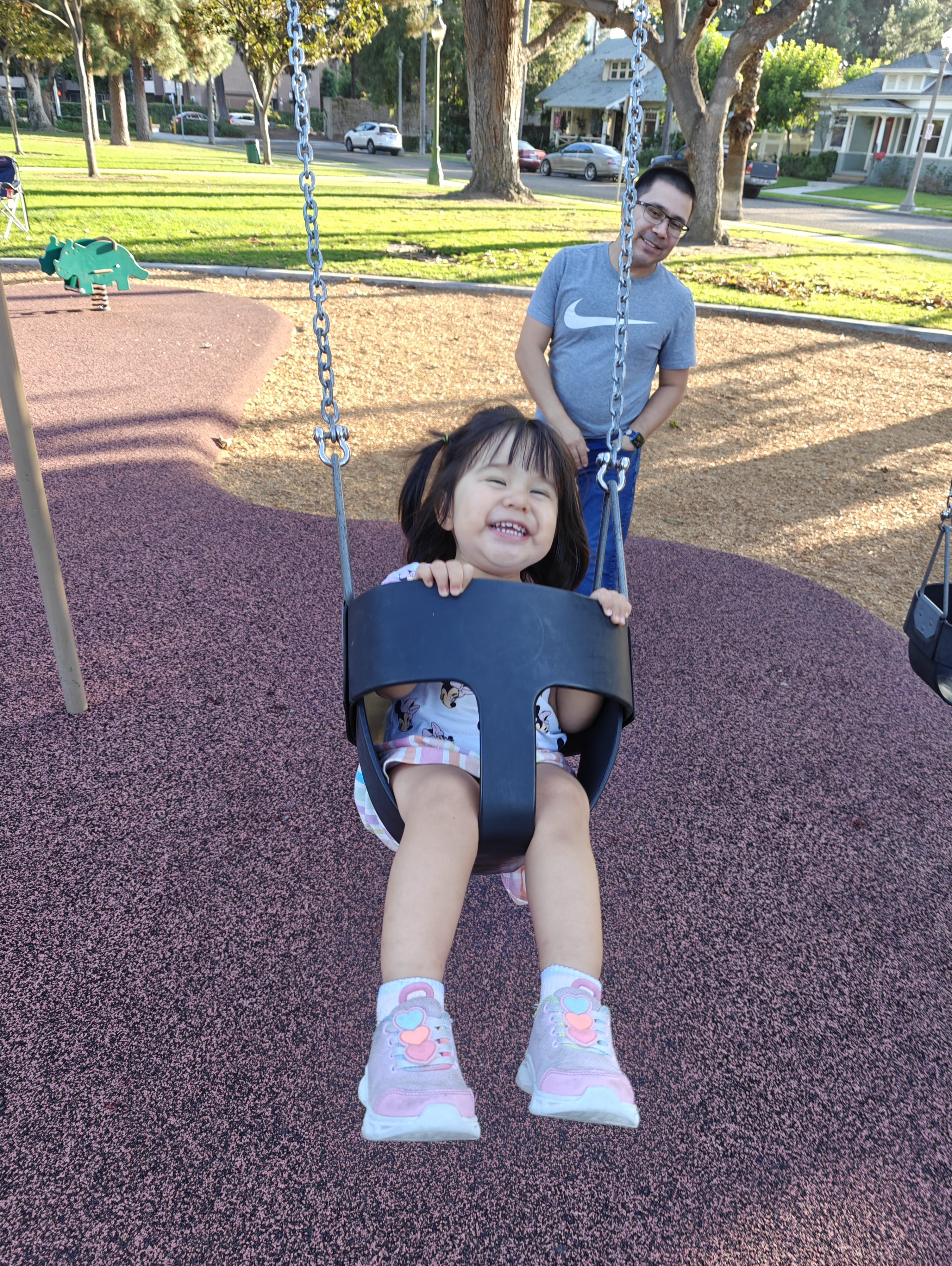 Toddler swinging taken on OnePlus Open.