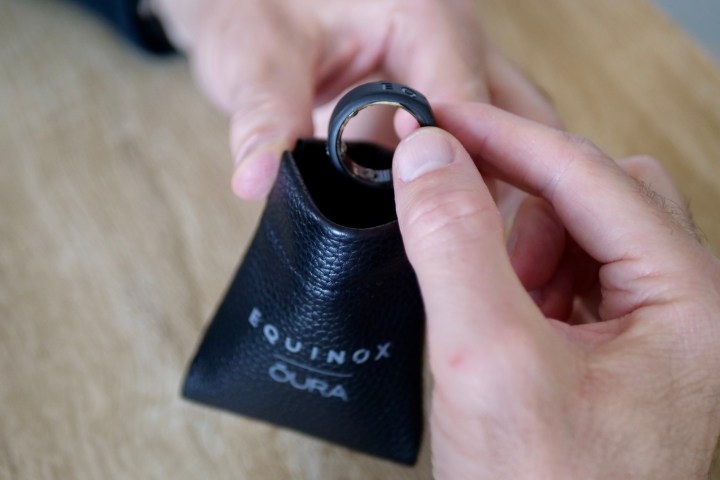 The Oura Ring in the Equinox Ring Cover, with the accessory pouch.