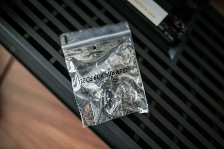 Motherboard screws in a small bag.