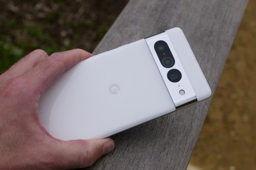 A person holding the Google Pixel 7 Pro, showing the back of the phone.