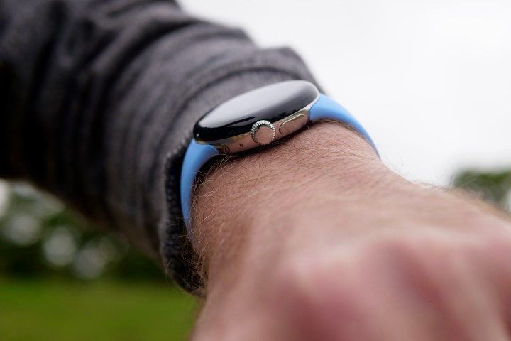 The side of the Google Pixel Watch 2, on a person's wrist.