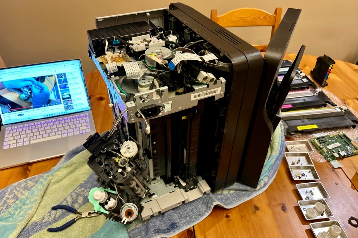 The Samsung Xpress C460FW on the operating table.