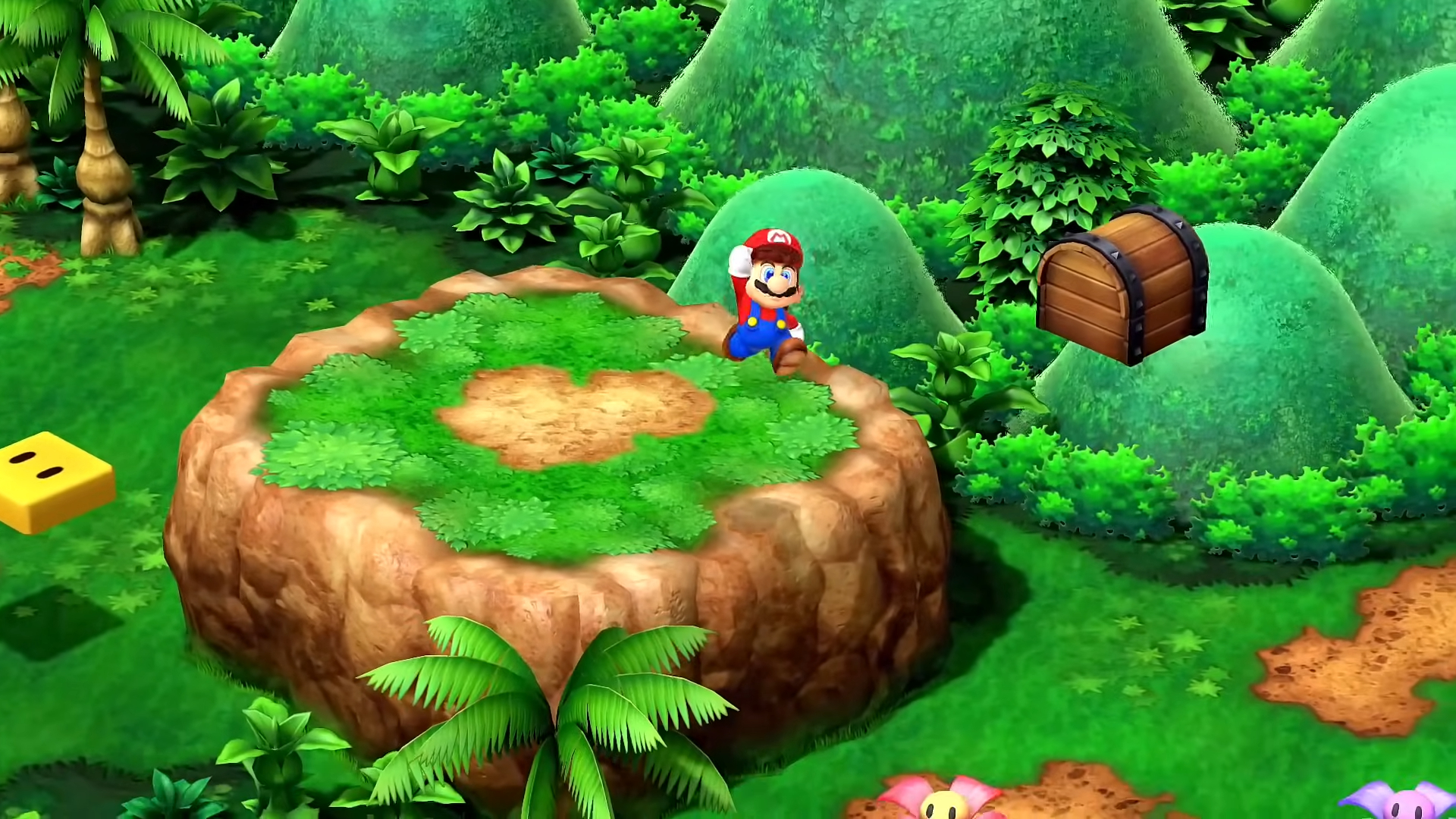 Mario jumping off a plateau.