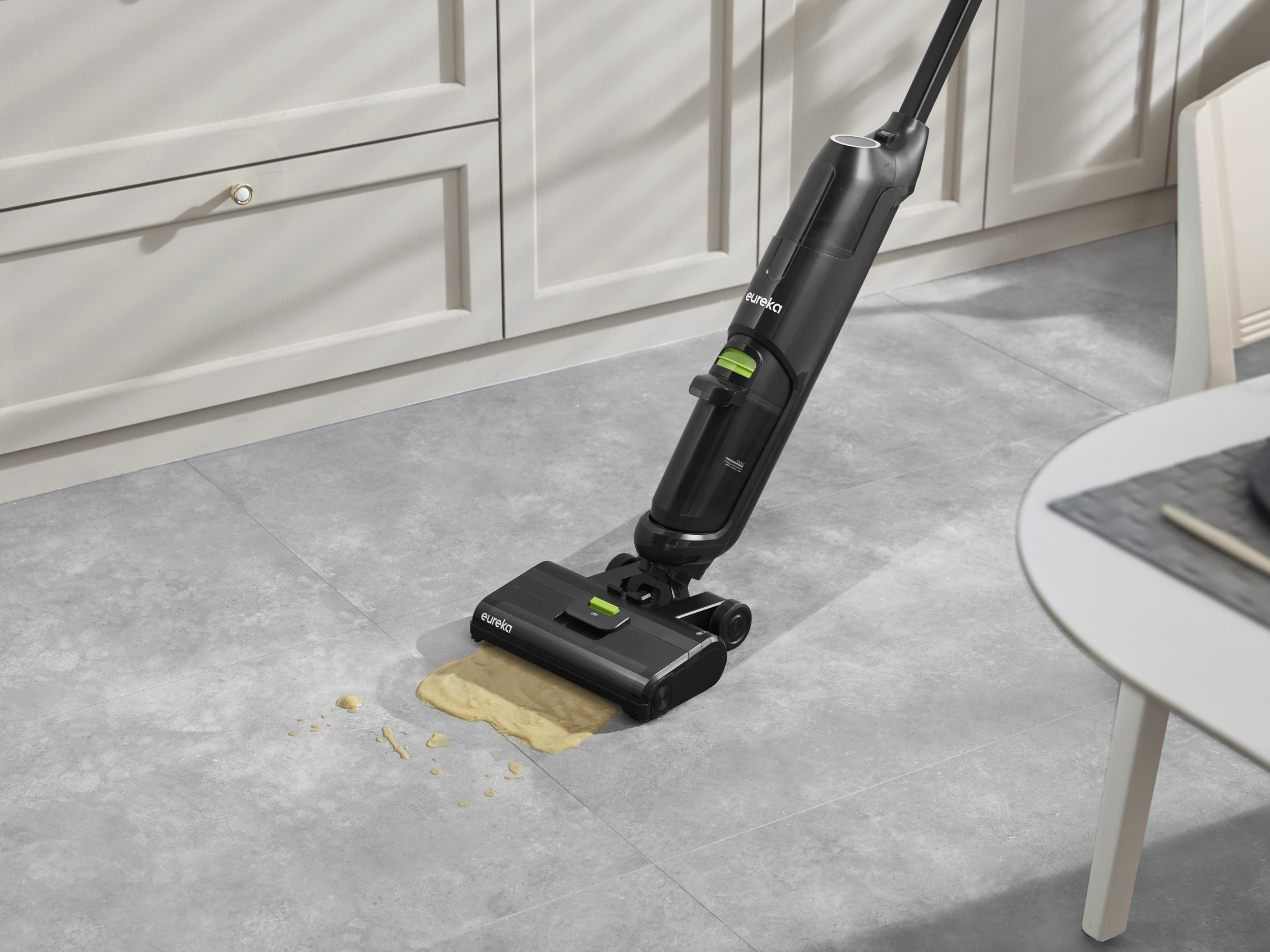 https://www.digitaltrends.com/wp-content/uploads/2023/11/Eureka-NEW400-cleaning-spill-in-kitchen.jpg?fit=720%2C539&p=1