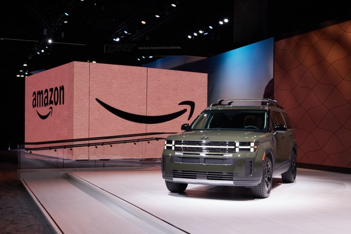 A 2024 Hyundai Santa Fe in front of a giant Amazon box.