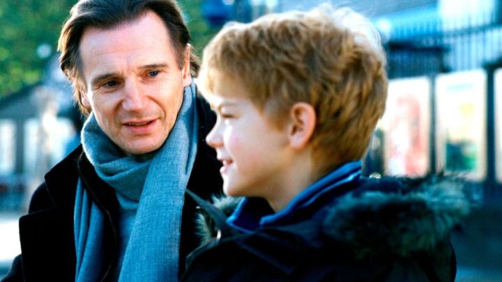 Liam Neeson and Thomas Brodie-Sangster as Dnaiel and Sam talking in Love Actually.